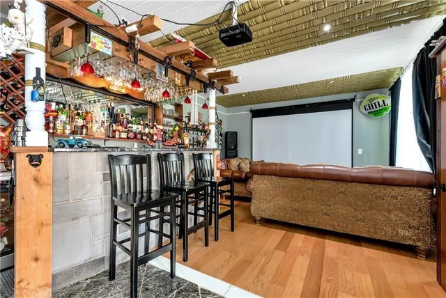 a view of hallway with wooden floor