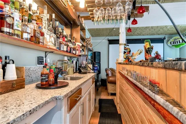 a room with furniture and a flat screen tv