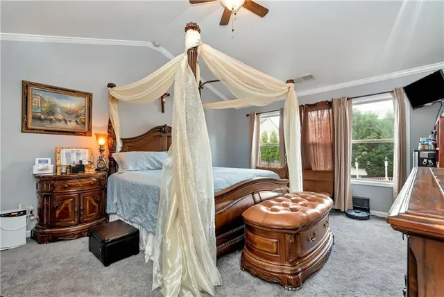 a bath tub sitting in a bathroom next to a window