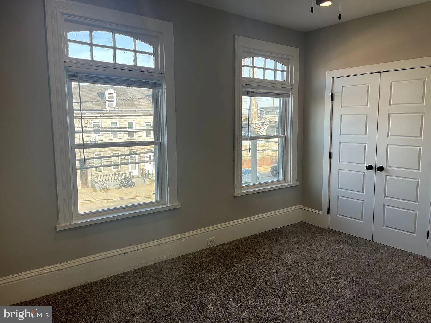 18 West Liberty Street Lancaster, PA 17603 - Photo 12 of 21 an empty room with windows