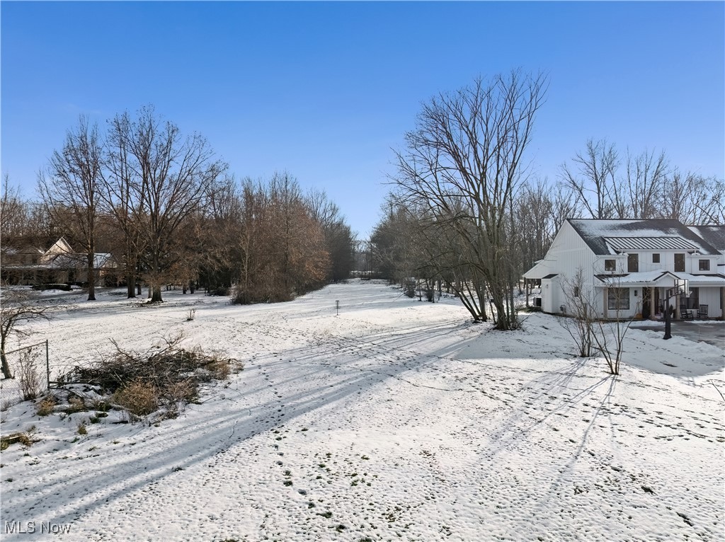 34549 Detroit Road Avon, OH 44011 - Photo 48 of 50 View of snowy yard w new home built behind