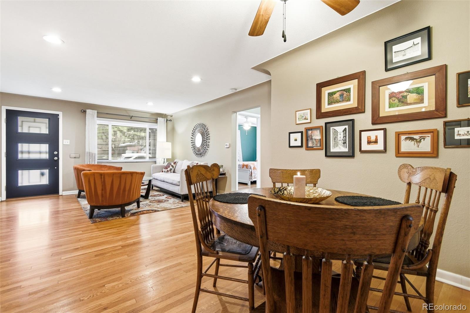 221 Oneida Street Denver, CO 80220 - Photo 6 of 24 a dining room with furniture and window