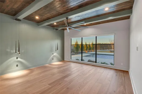 a view of an empty room with sliding door