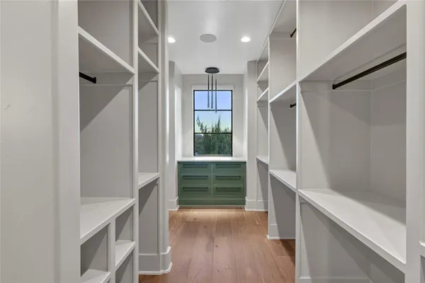 a view of entryway with stairs and wooden floor