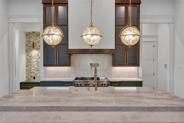 a view of a wooden floor with a table and a clock
