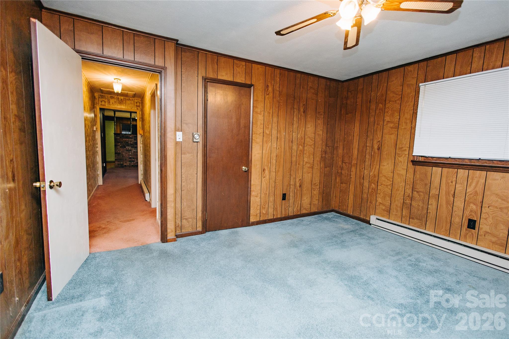 205 Bond Street Marion, NC 28752 - Photo 14 of 37 a view of an empty room with a window