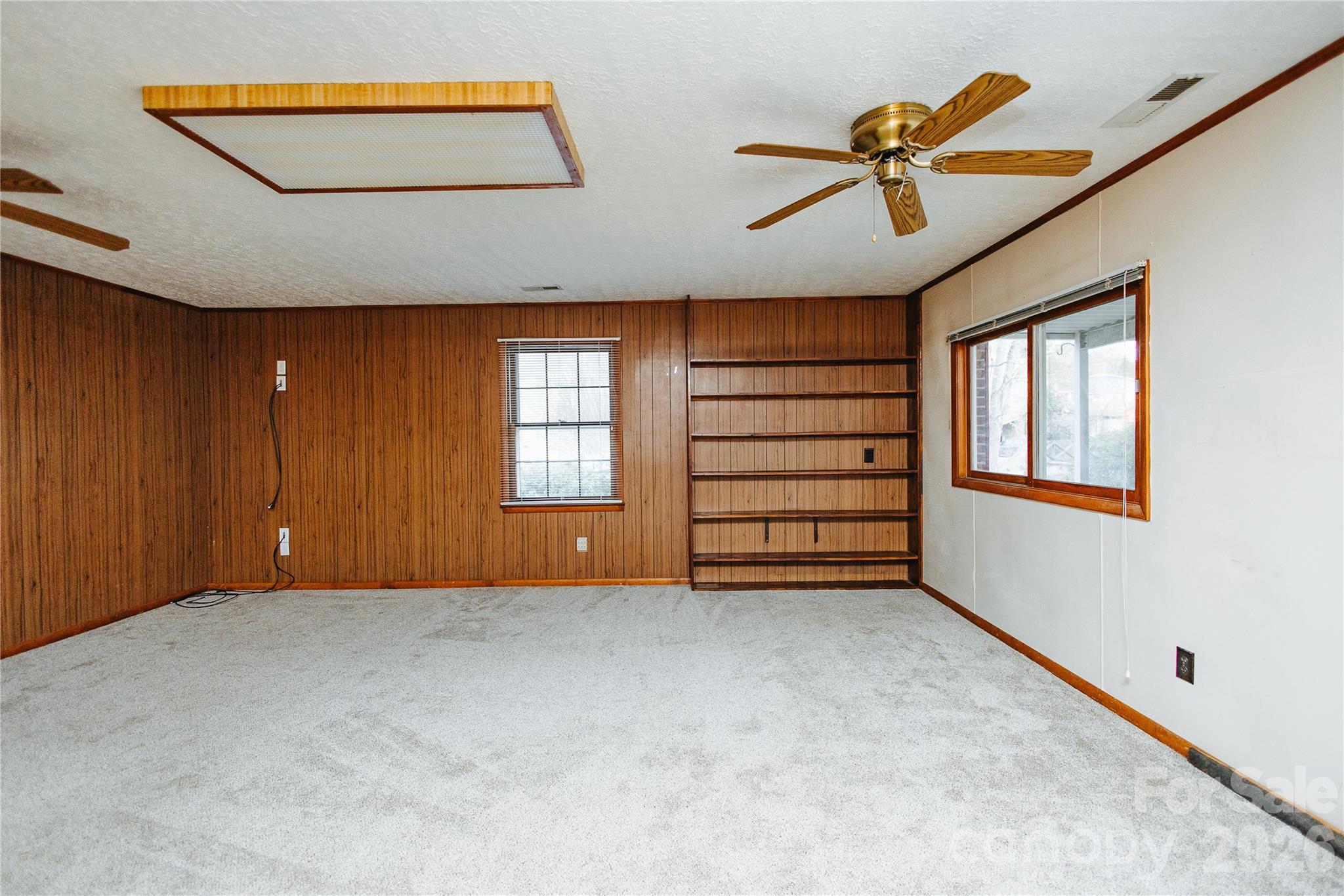 205 Bond Street Marion, NC 28752 - Photo 29 of 37 a view of an empty room with a window