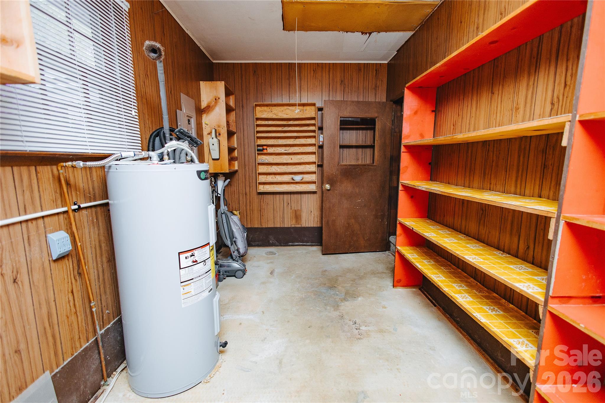 205 Bond Street Marion, NC 28752 - Photo 32 of 37 a view of storage and utility room