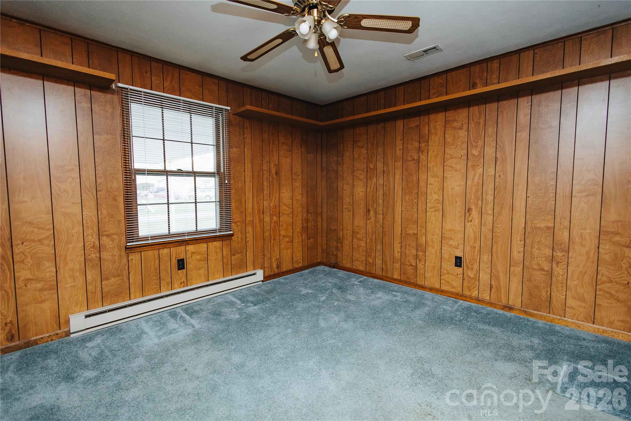 205 Bond Street Marion, NC 28752 - Photo 34 of 37 a view of an empty room with a window