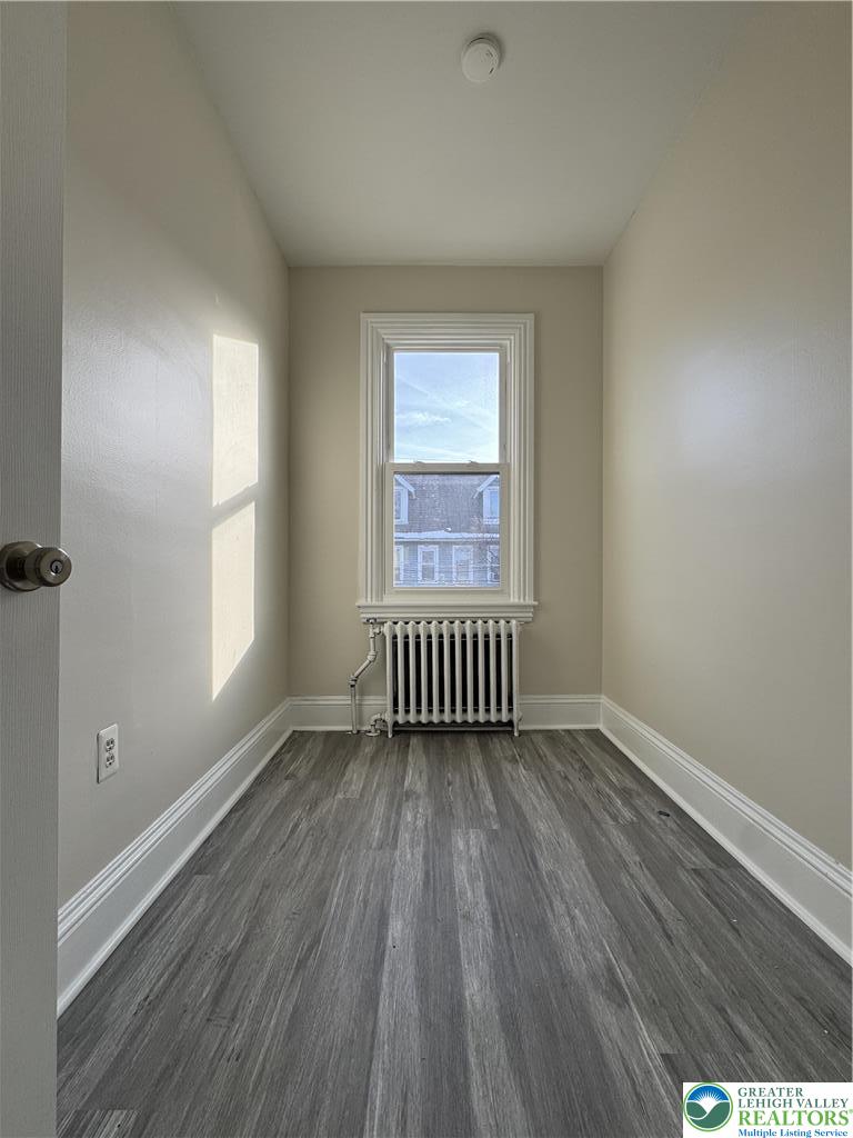 612 East 5th Street Bethlehem, PA 18015 - Photo 18 of 31 a view of an empty room with wooden floor and a window