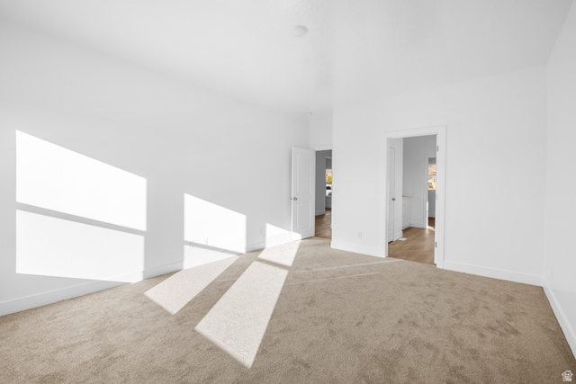 1510 West 600 North, Unit 4A Mapleton, UT 84664 - Photo 14 of 23 Unfurnished bedroom with light carpet and baseboards