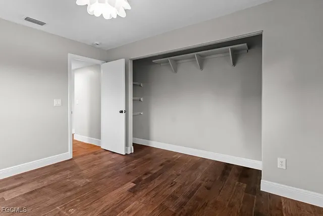 a view of a porch with a floor to ceiling windows