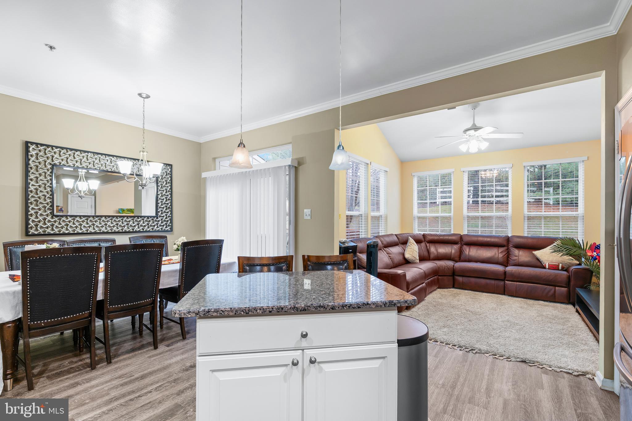 1067 Campbell Meadows Road Owings Mills, MD 21117 - Photo 12 of 32 a living room with furniture wooden floor and a large window
