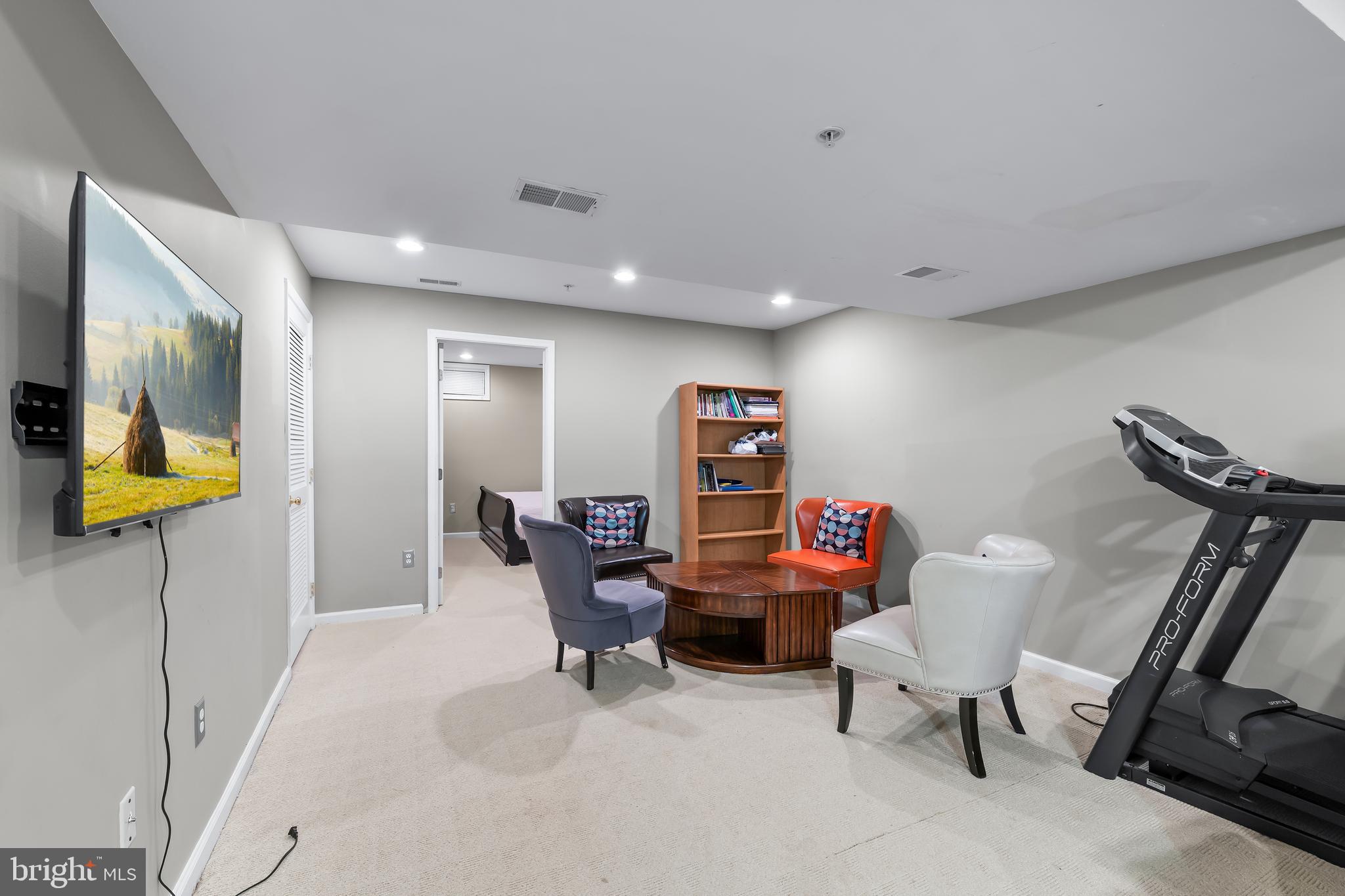 1067 Campbell Meadows Road Owings Mills, MD 21117 - Photo 25 of 32 a living room with furniture and a flat screen tv