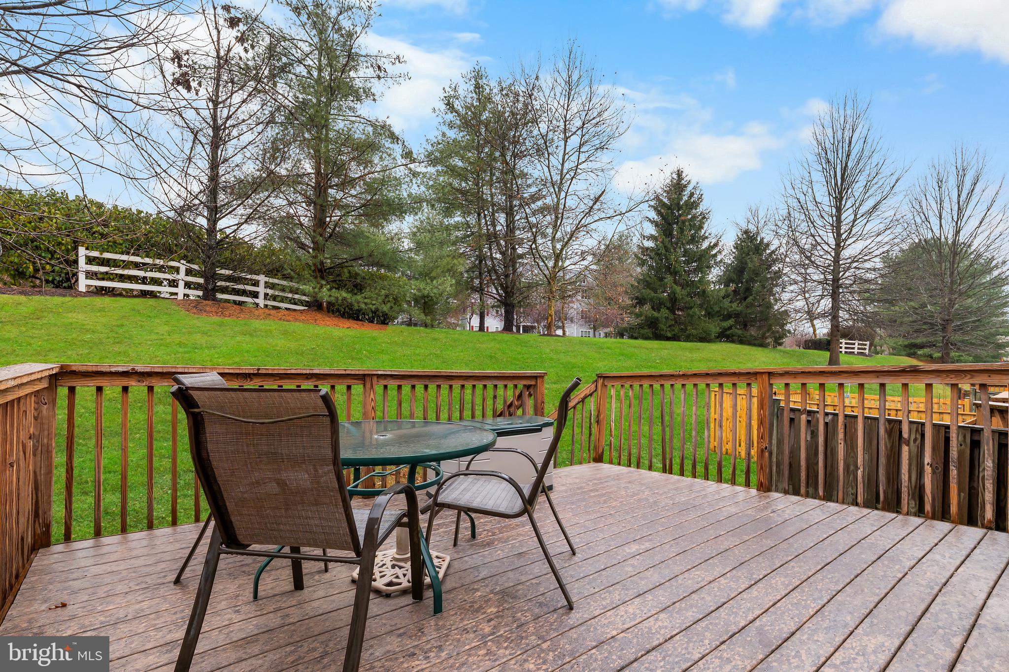1067 Campbell Meadows Road Owings Mills, MD 21117 - Photo 28 of 32 a view of a wooden deck with furniture