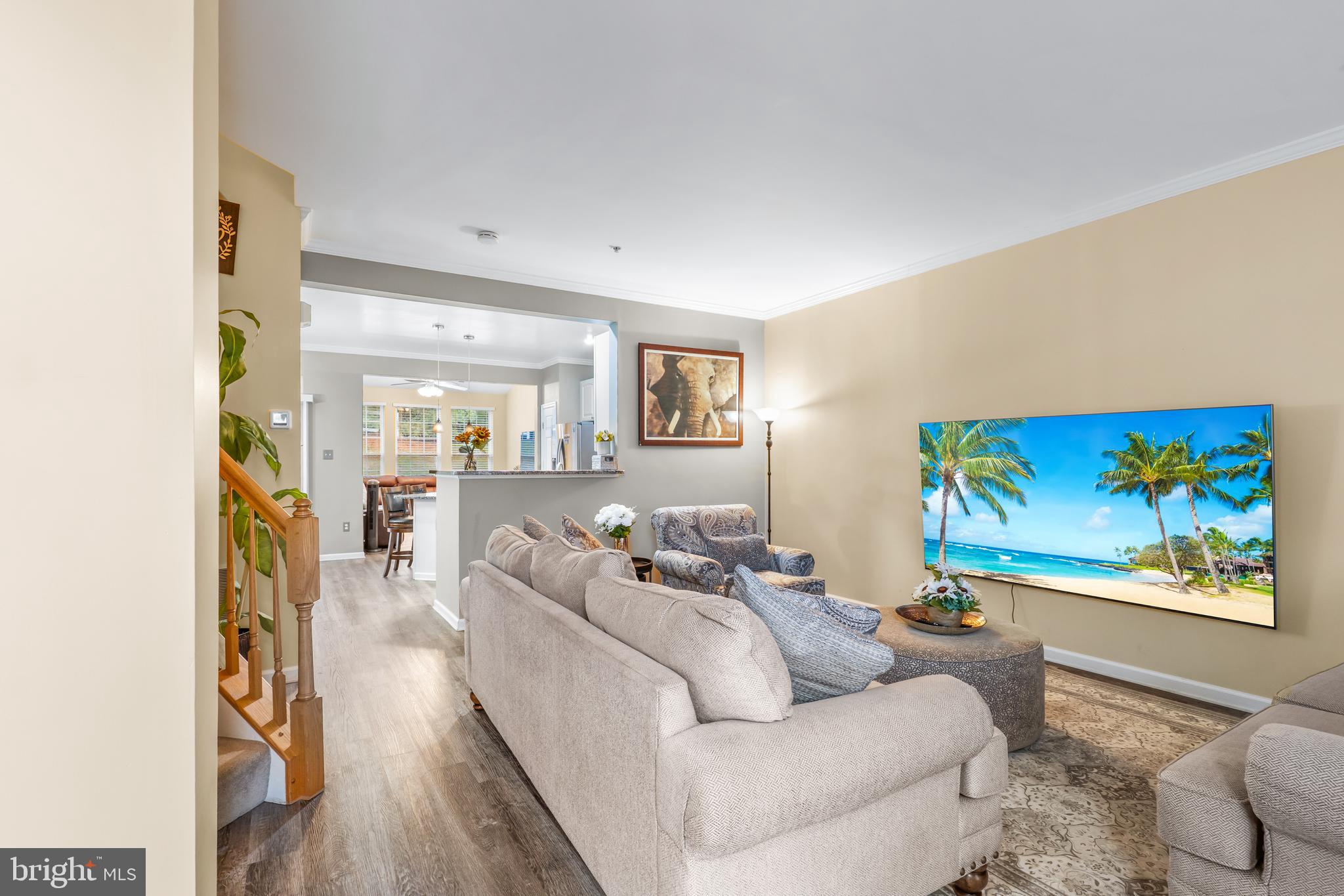 1067 Campbell Meadows Road Owings Mills, MD 21117 - Photo 4 of 32 a living room with furniture and a painting on the wall