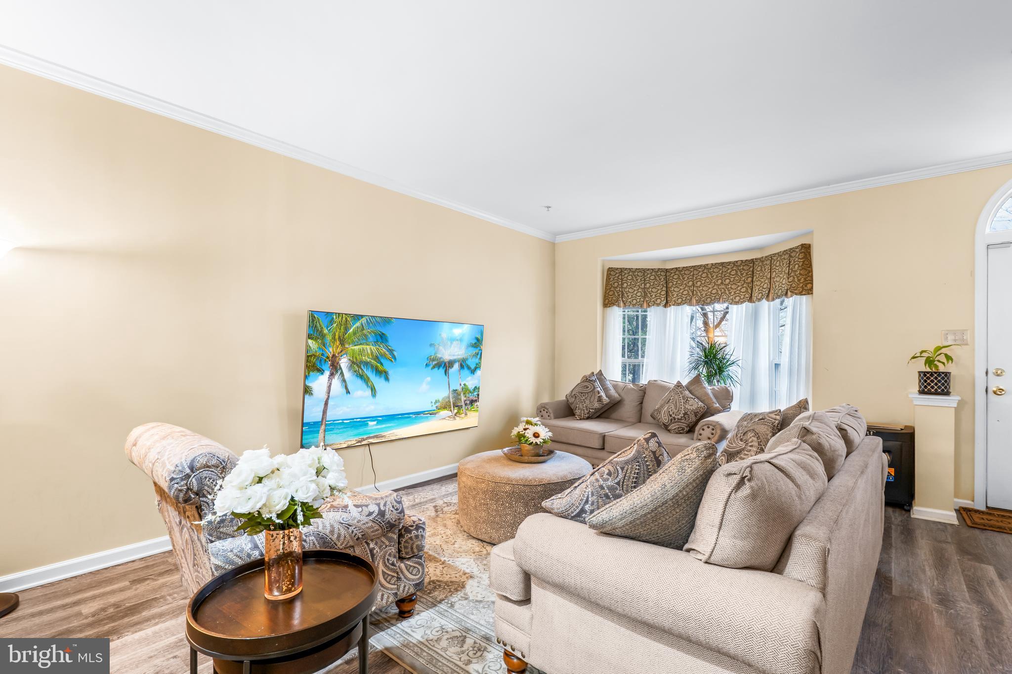 1067 Campbell Meadows Road Owings Mills, MD 21117 - Photo 6 of 32 a living room with furniture and a wooden floor