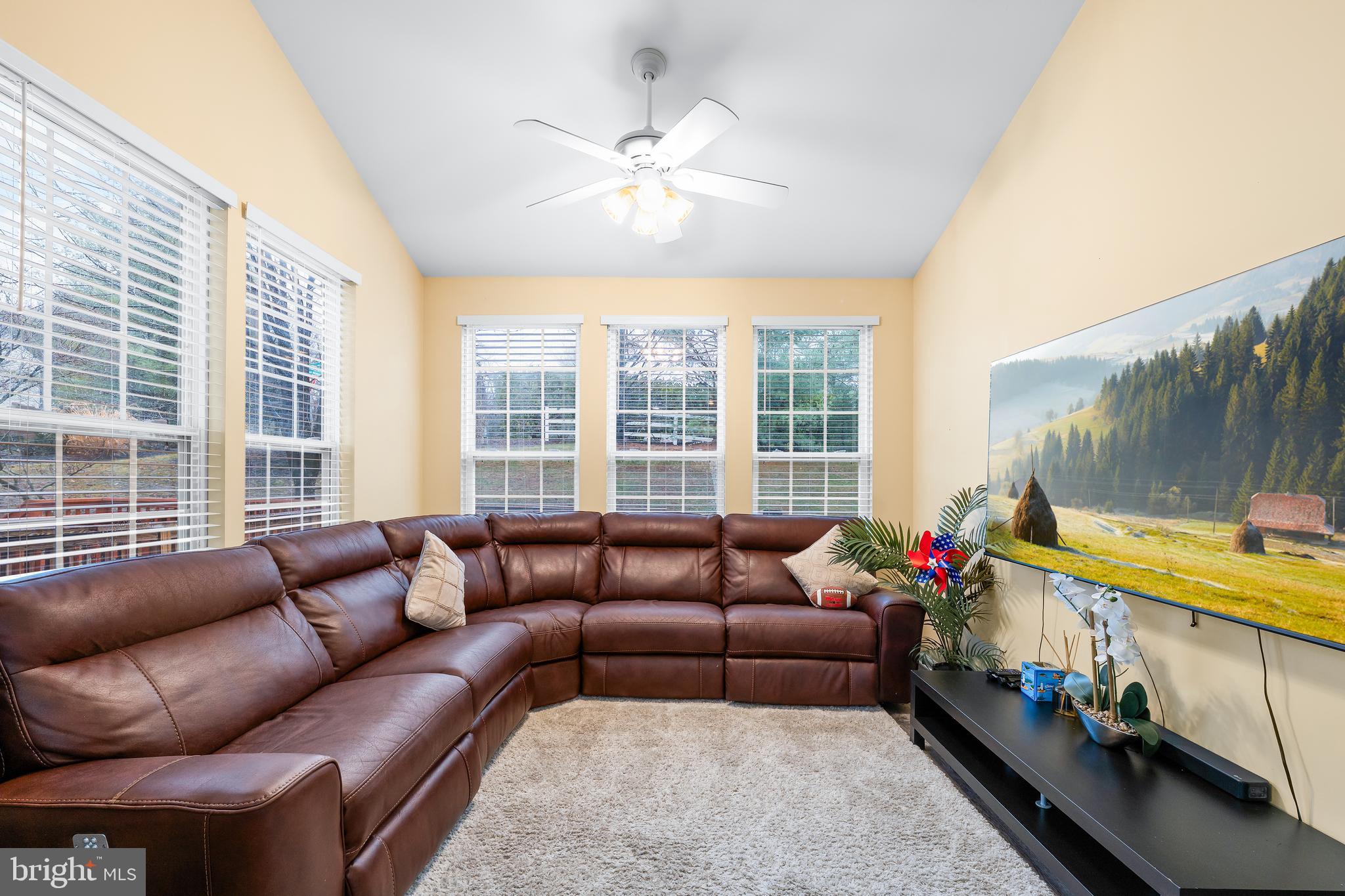 1067 Campbell Meadows Road Owings Mills, MD 21117 - Photo 7 of 32 a living room with furniture and a flat screen tv