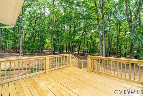 865 Sulphur Spring Road Prospect, VA 23960 - Photo 8 of 40 Expansive wooden deck with natural wood railing an