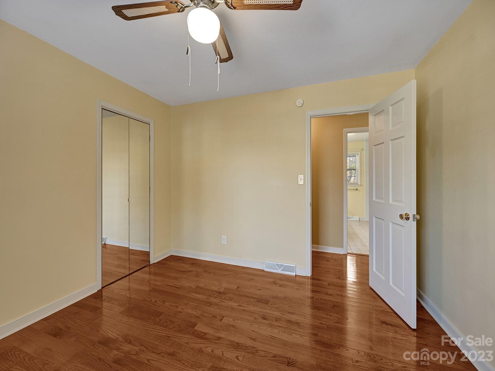 4130 Witherow Road Winston-Salem, NC 27106 - Photo 16 of 39 a view of empty room with wooden floor