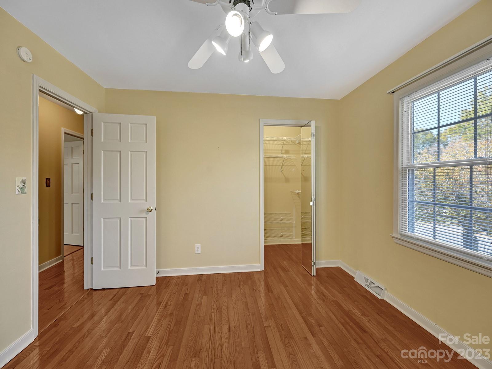 4130 Witherow Road Winston-Salem, NC 27106 - Photo 21 of 39 an empty room with wooden floor and windows