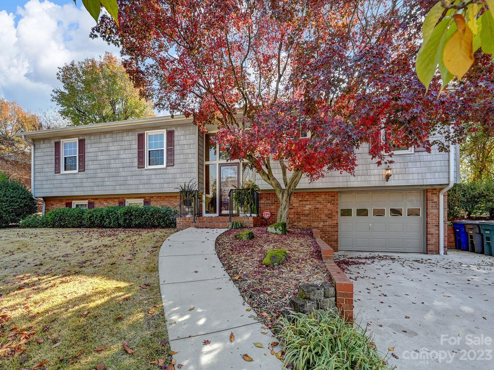 4130 Witherow Road Winston-Salem, NC 27106 - Photo 3 of 39 a front view of a house with garden