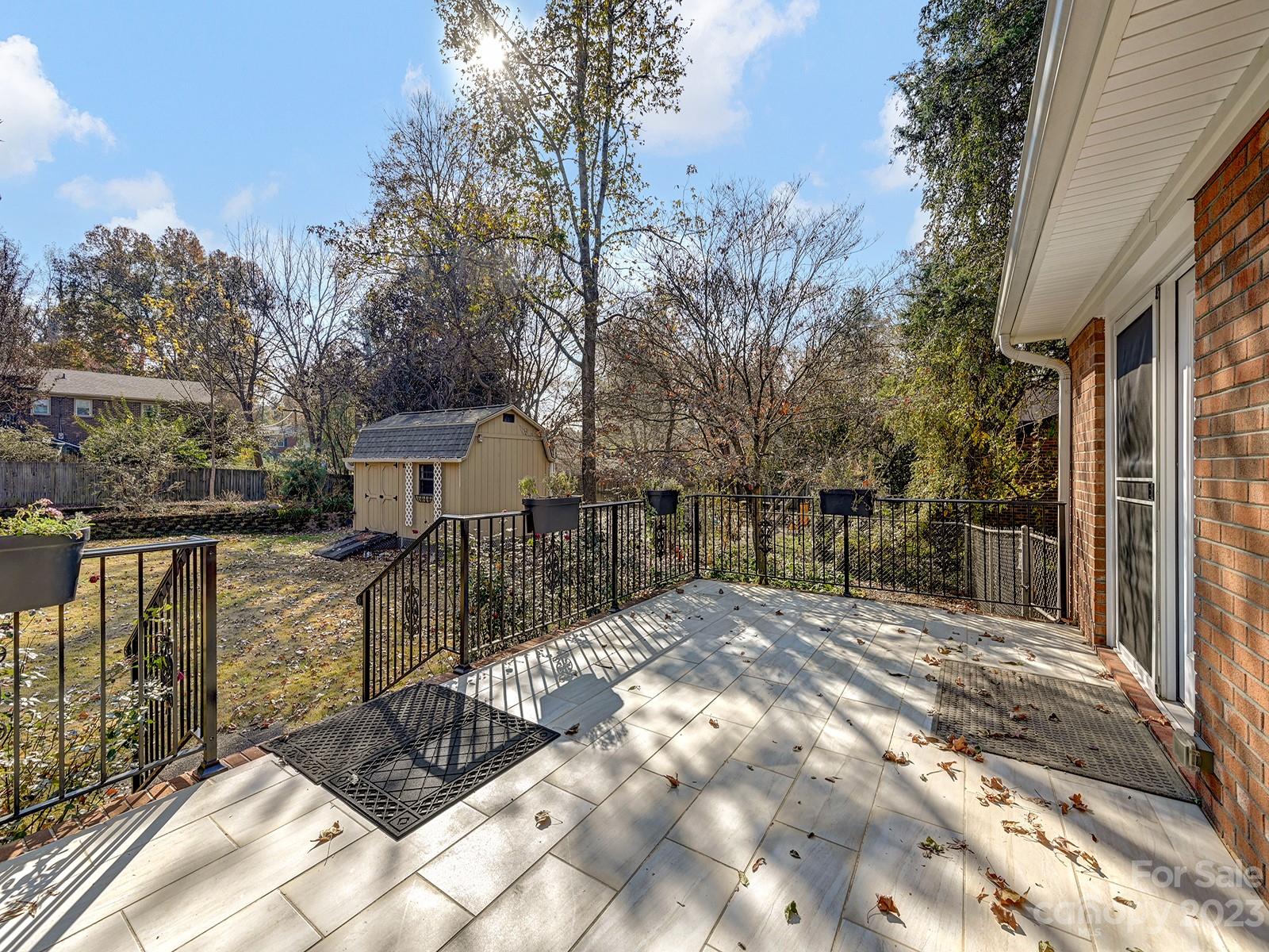 4130 Witherow Road Winston-Salem, NC 27106 - Photo 33 of 39 a view of a house with backyard and sitting area