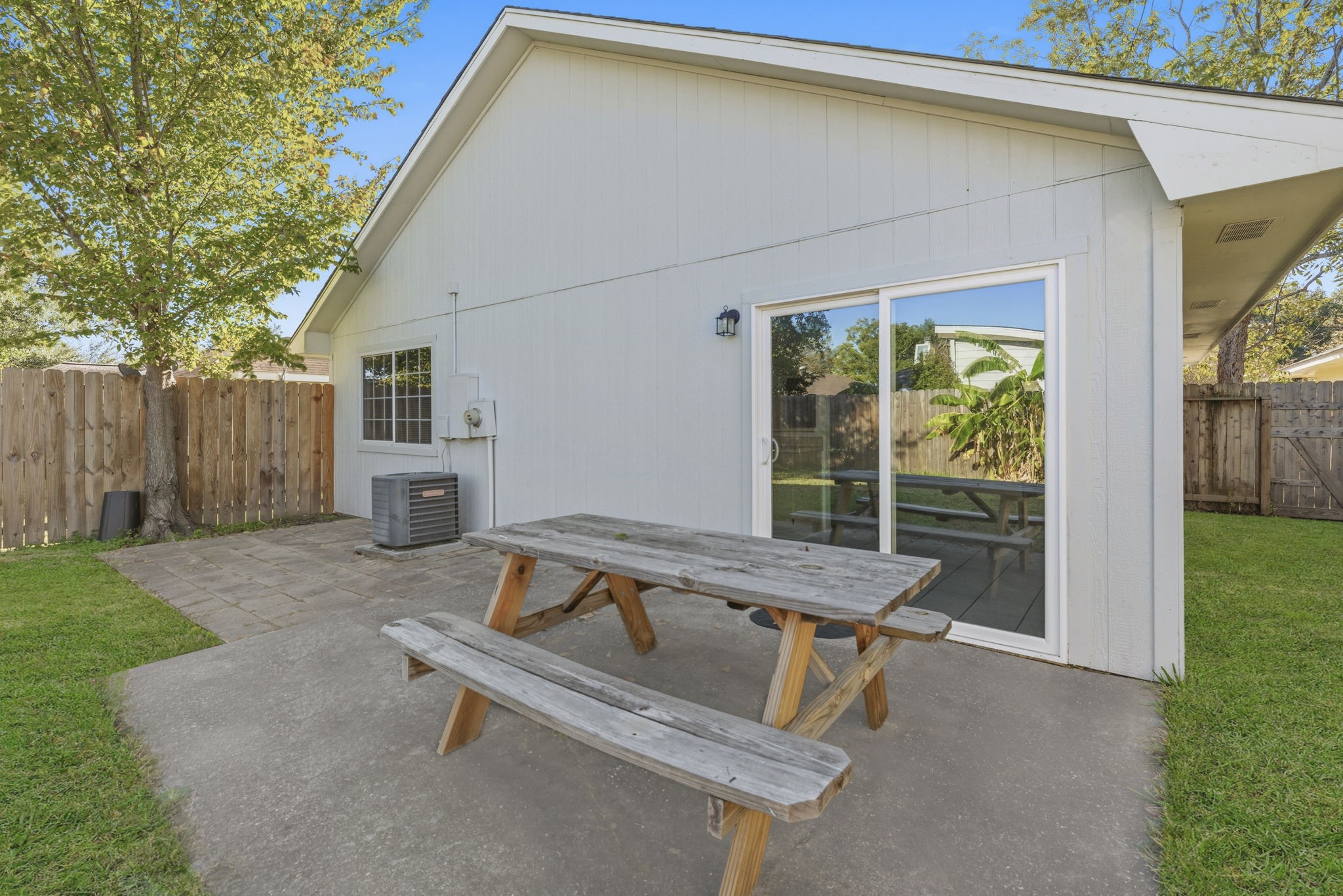 23314 Prairie Bird Drive Spring, TX 77373 - Photo 20 of 20 a backyard of a house with table and chairs