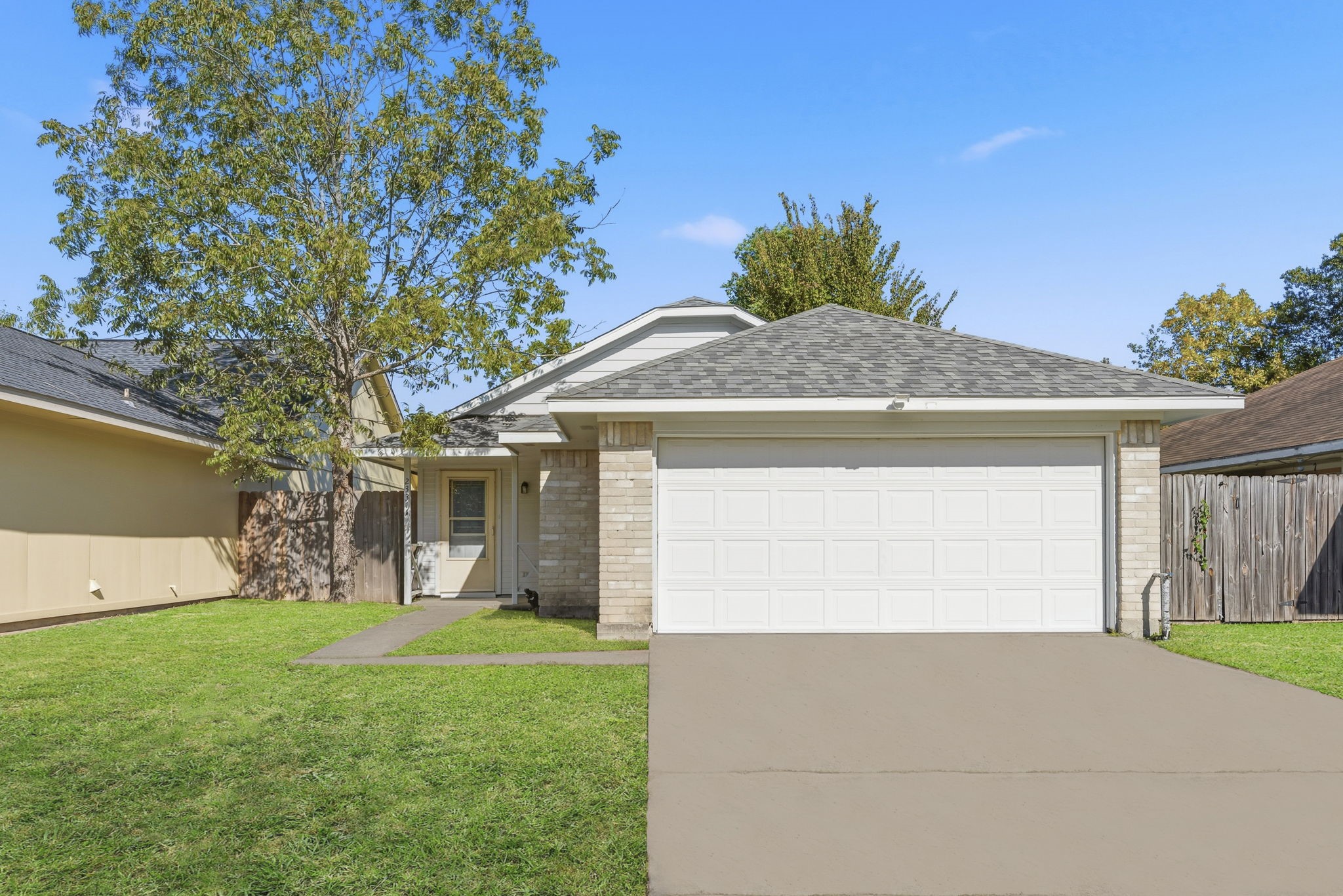 23314 Prairie Bird Drive Spring, TX 77373 - Photo 2 of 20 a front view of house with yard and green space
