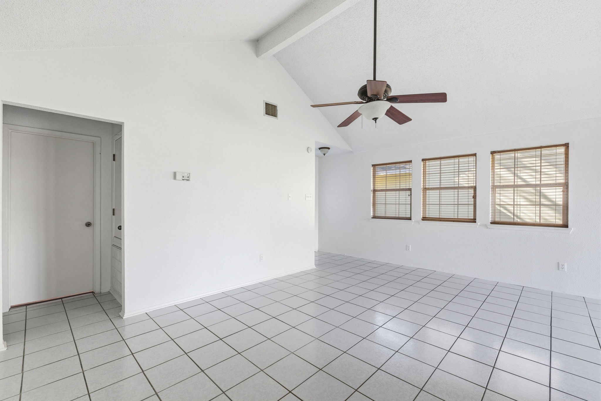 23314 Prairie Bird Drive Spring, TX 77373 - Photo 7 of 20 a view of an empty room with a window