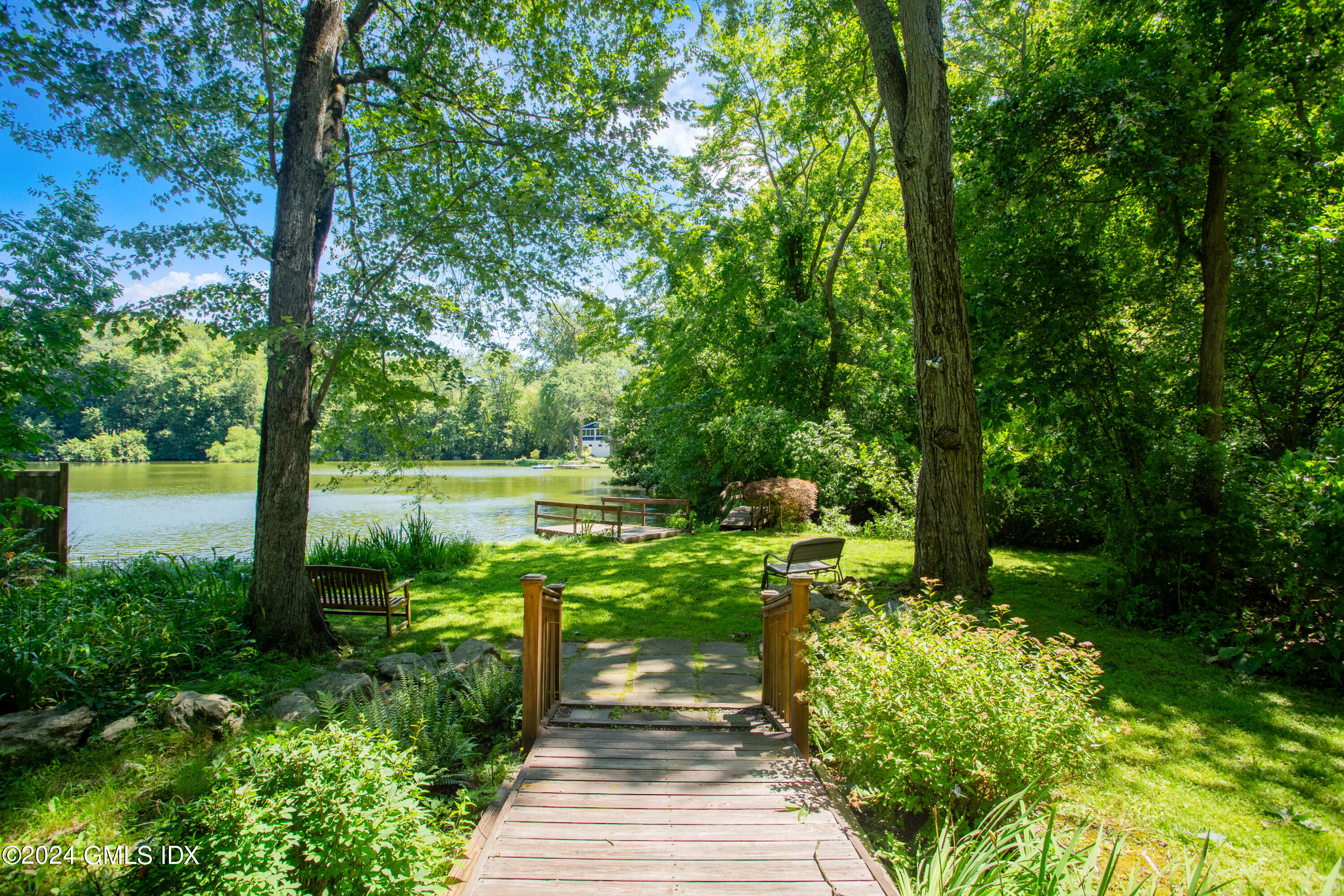 45 Cousins Road Stamford, CT 06903 - Photo 15 of 23 a pathway of a lake