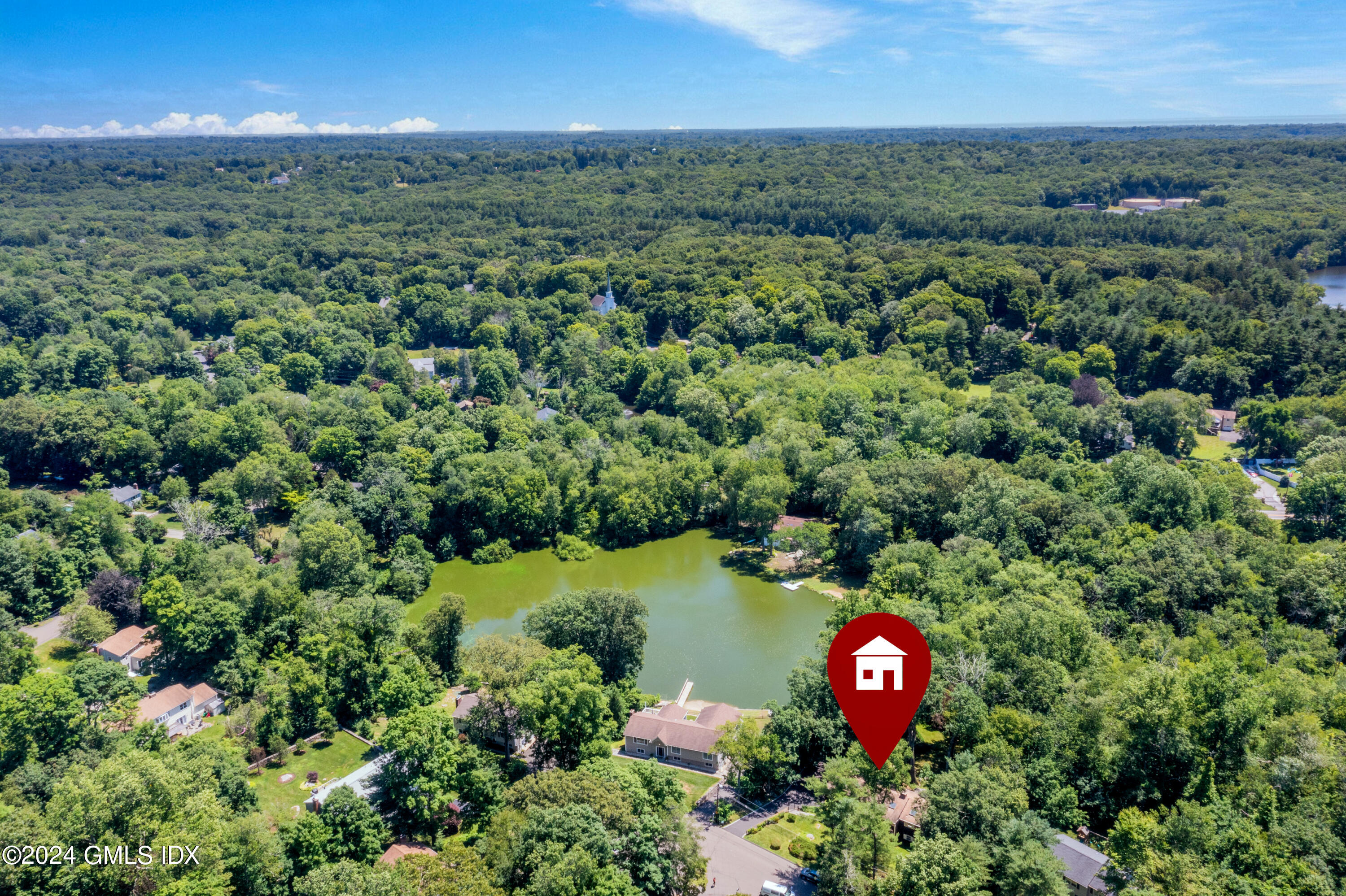 45 Cousins Road Stamford, CT 06903 - Photo 19 of 23 an aerial view of a house with a yard and lake view