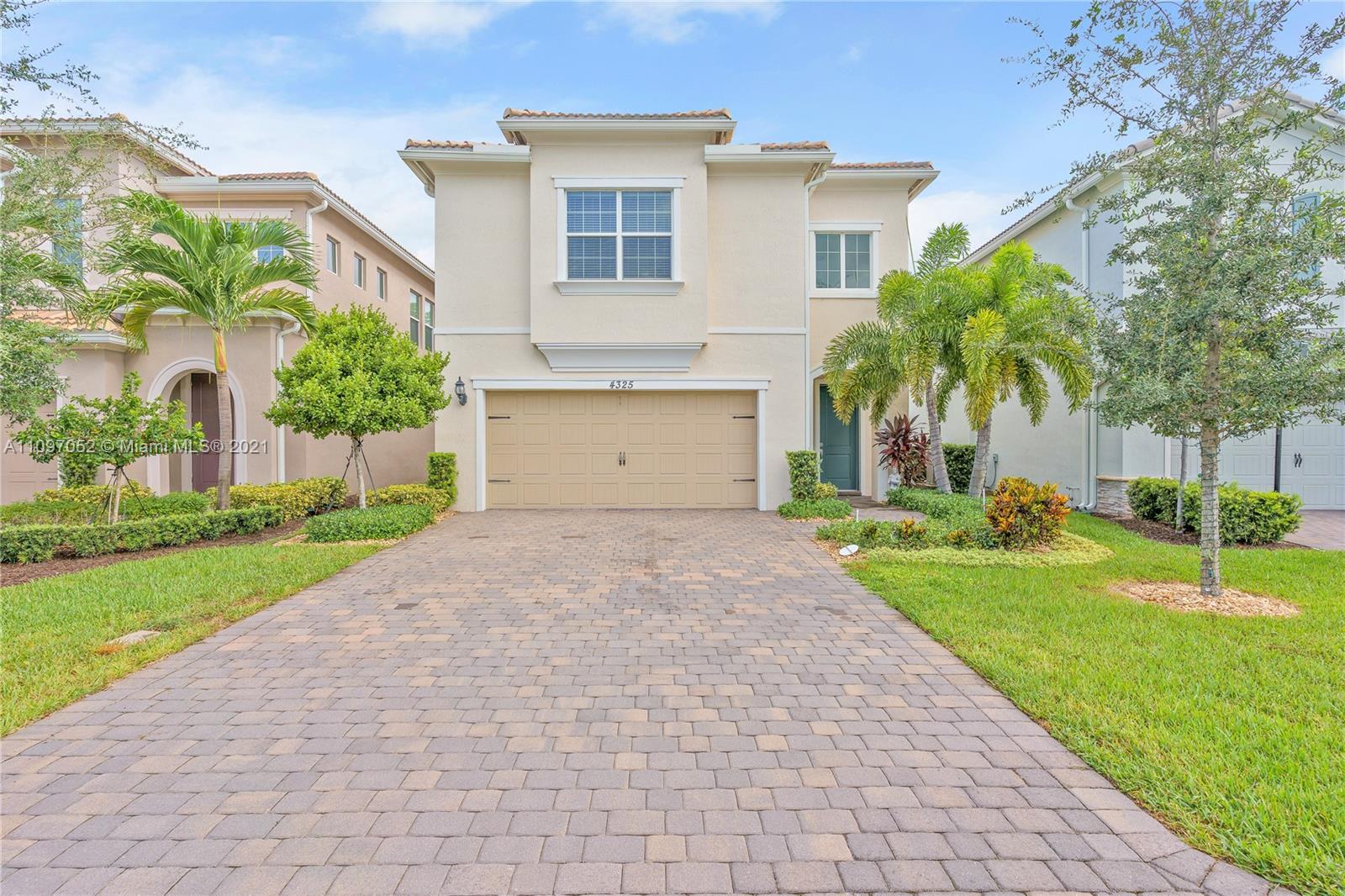 4325 Large Leaf Lane Hollywood, FL 33021 - Photo 11 of 42 a front view of house with yard and green space