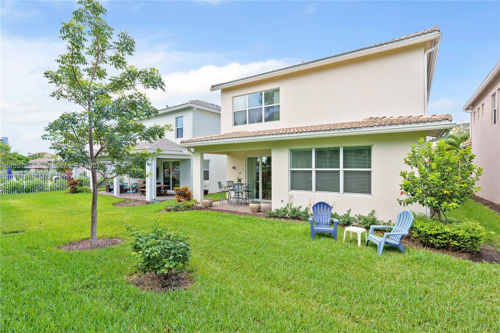 4325 Large Leaf Lane Hollywood, FL 33021 - Photo 13 of 42 a front view of house with yard