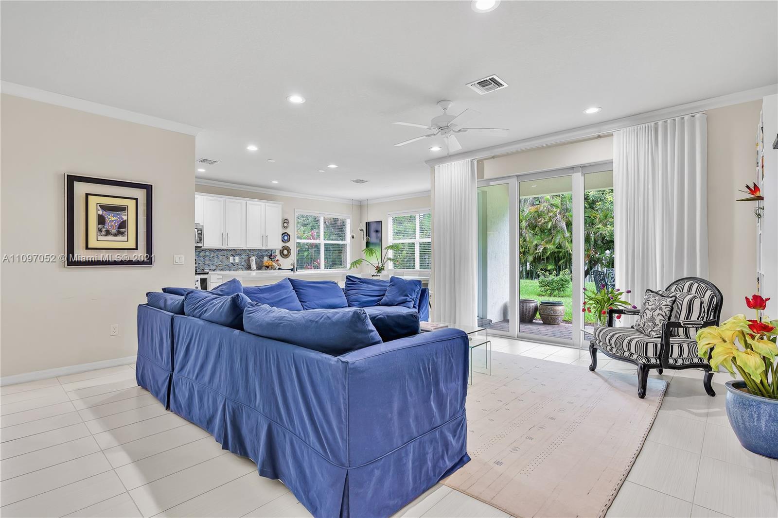 4325 Large Leaf Lane Hollywood, FL 33021 - Photo 16 of 42 a living room with furniture and a large window