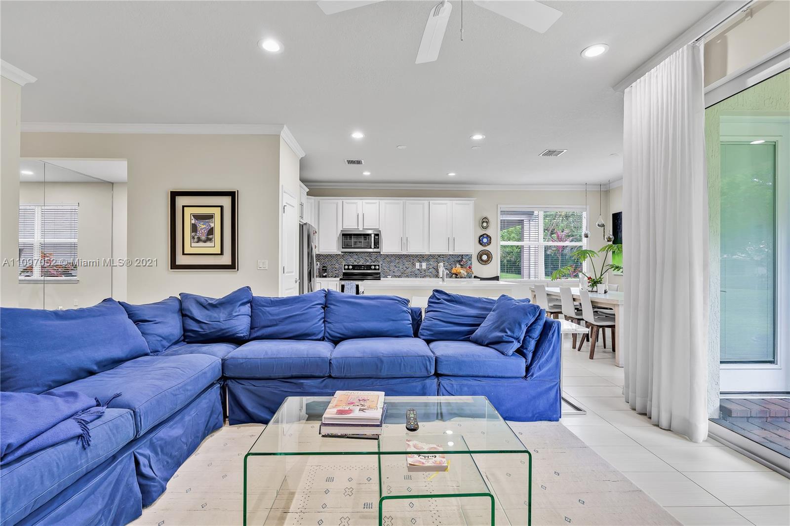 4325 Large Leaf Lane Hollywood, FL 33021 - Photo 21 of 42 a living room with furniture and kitchen view