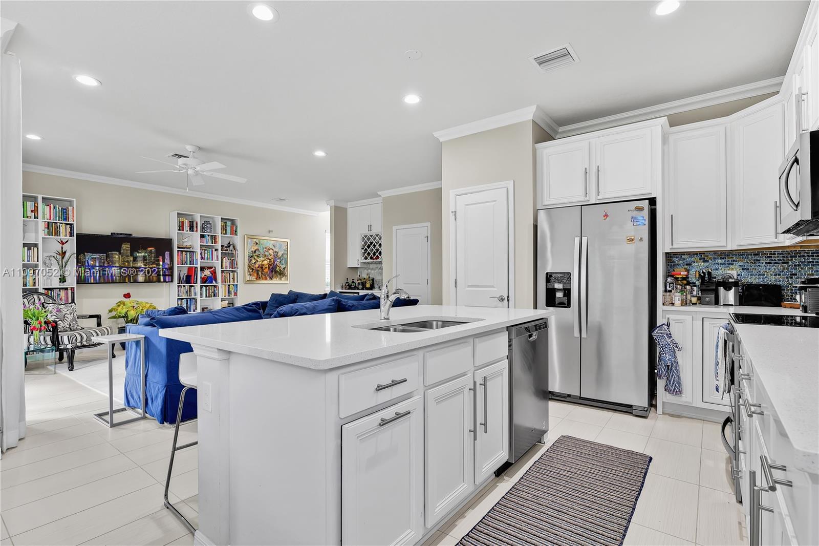 4325 Large Leaf Lane Hollywood, FL 33021 - Photo 24 of 42 a kitchen with stainless steel appliances a sink and a refrigerator