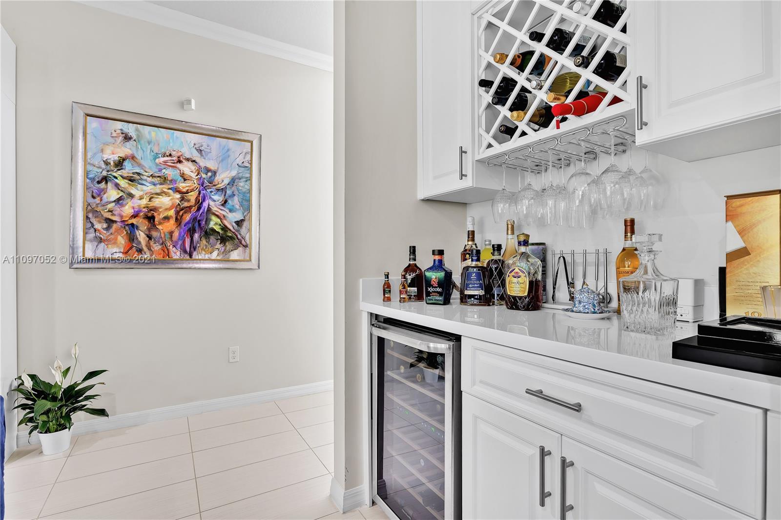 4325 Large Leaf Lane Hollywood, FL 33021 - Photo 27 of 42 a kitchen with stainless steel appliances a counter space and cabinets