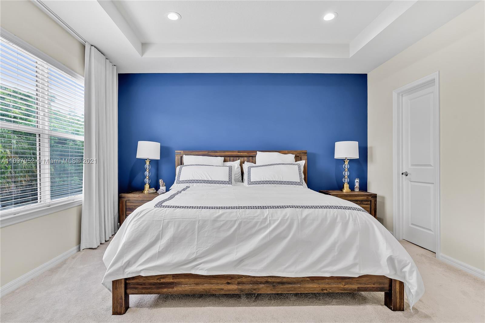 4325 Large Leaf Lane Hollywood, FL 33021 - Photo 36 of 42 a bedroom with a bed and window