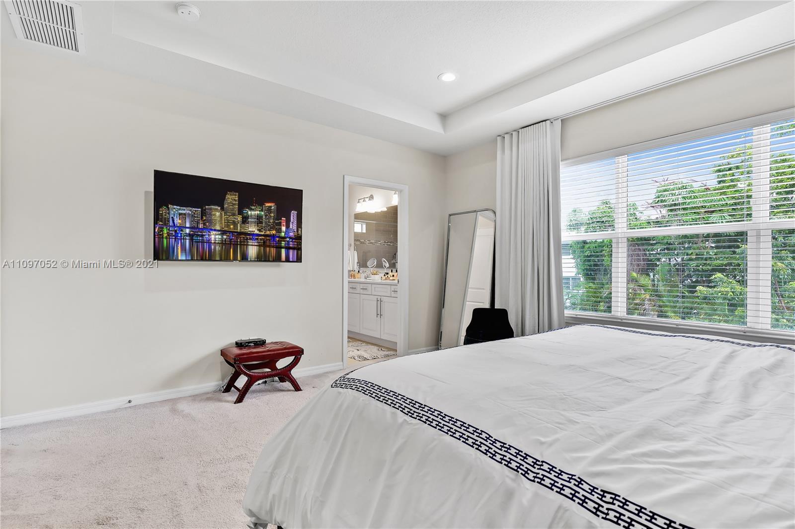 4325 Large Leaf Lane Hollywood, FL 33021 - Photo 37 of 42 a bed room with a bed and a chair