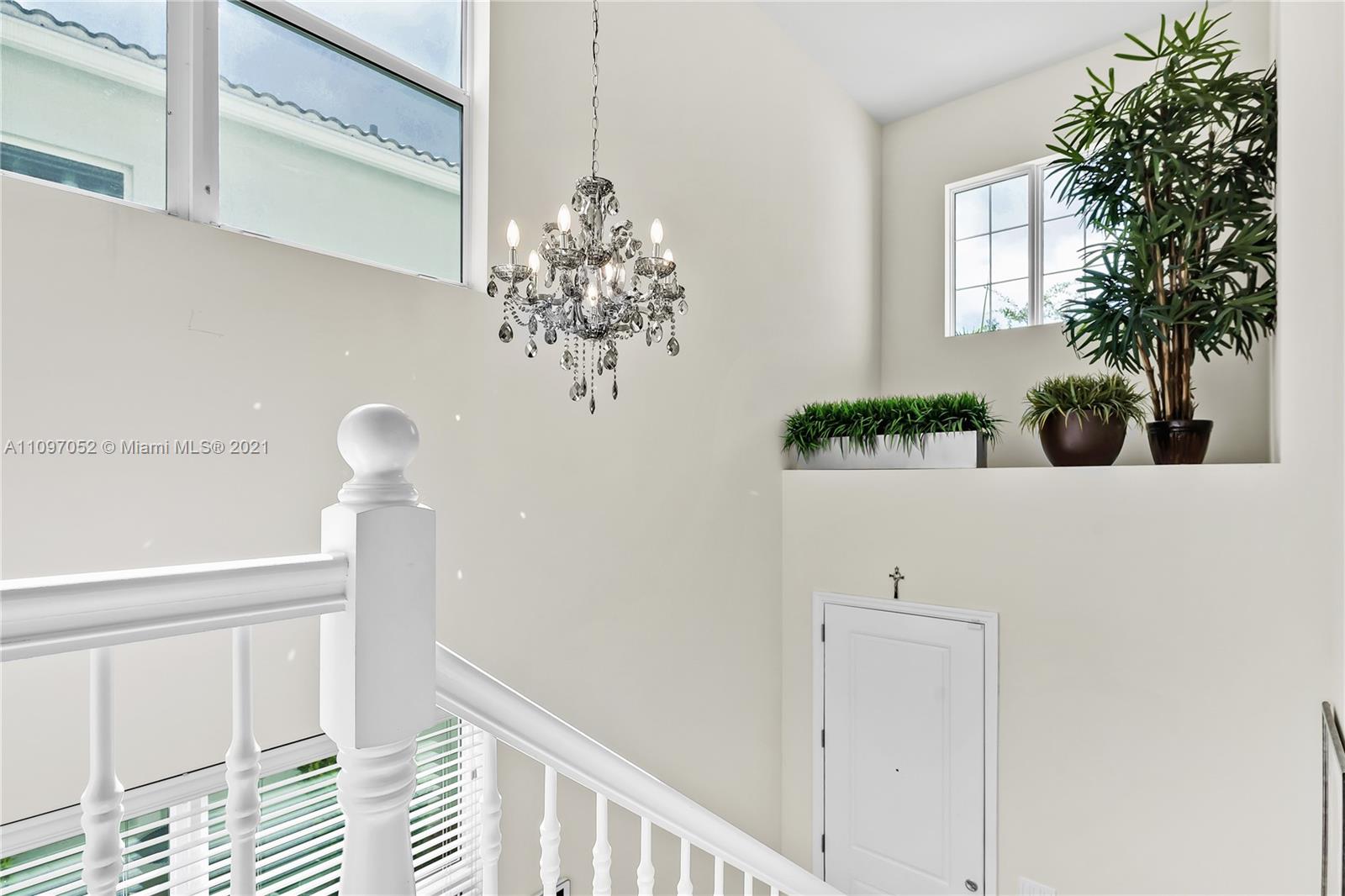 4325 Large Leaf Lane Hollywood, FL 33021 - Photo 42 of 42 a view of a bedroom with a potted plant
