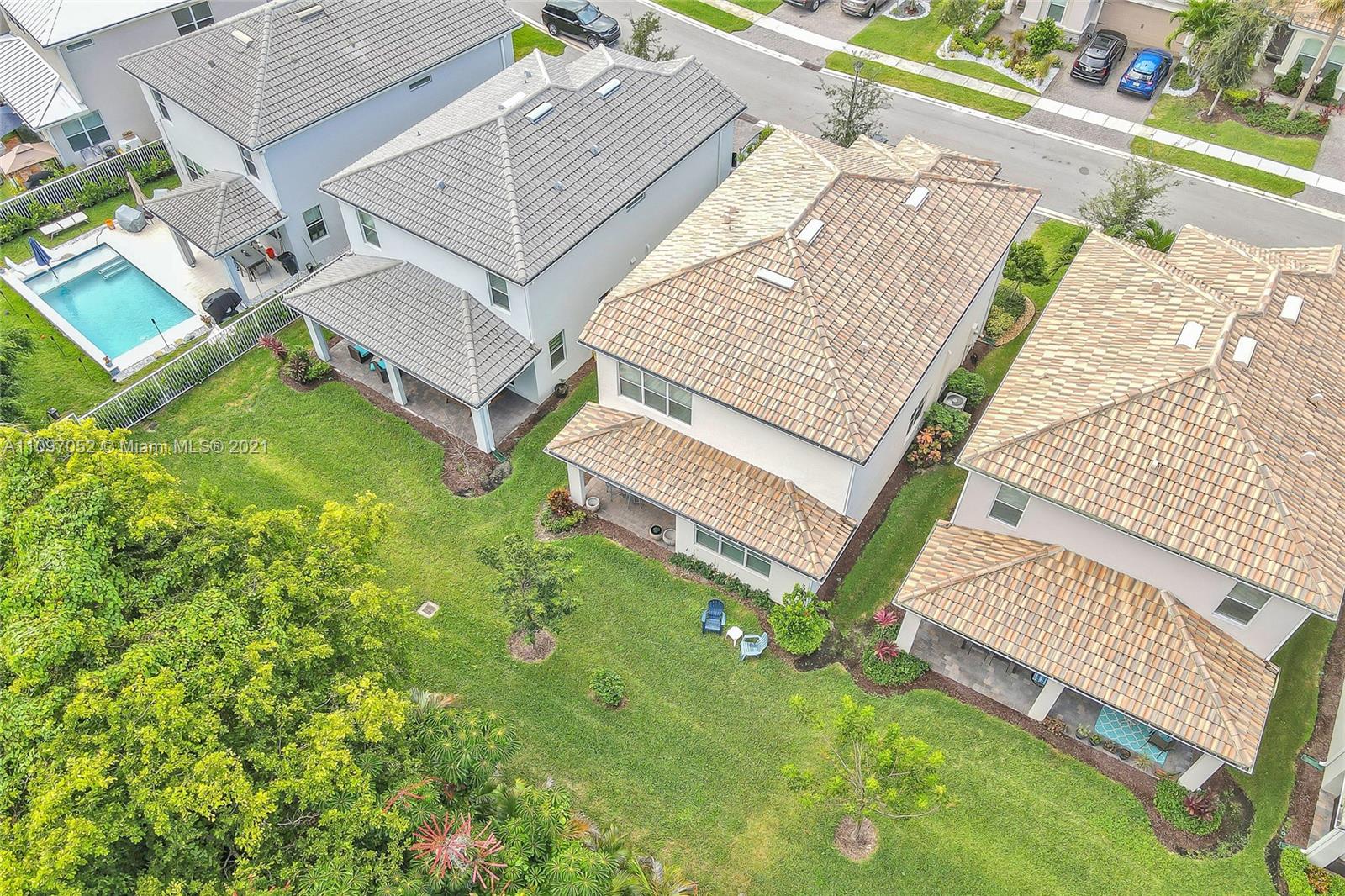 4325 Large Leaf Lane Hollywood, FL 33021 - Photo 7 of 42 an aerial view of a house with a garden