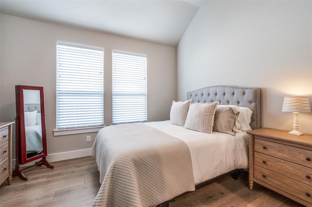 2901 Quinton Street Prosper, TX 75078 - Photo 18 of 27 a bedroom with a bed and a window