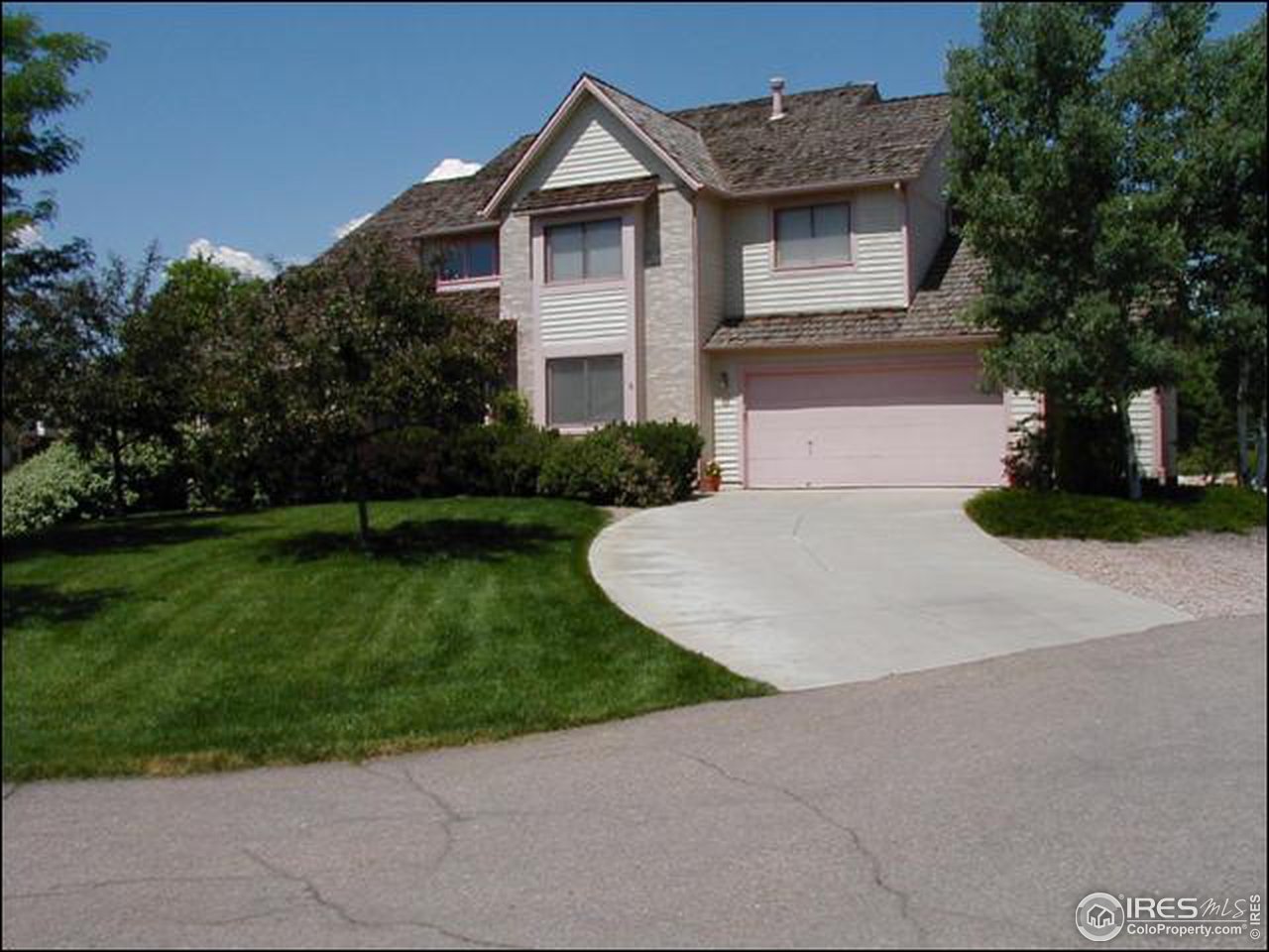 7223 Four Rivers Road Boulder, CO 80301 - Photo 1 of 12 a front view of a house with a yard