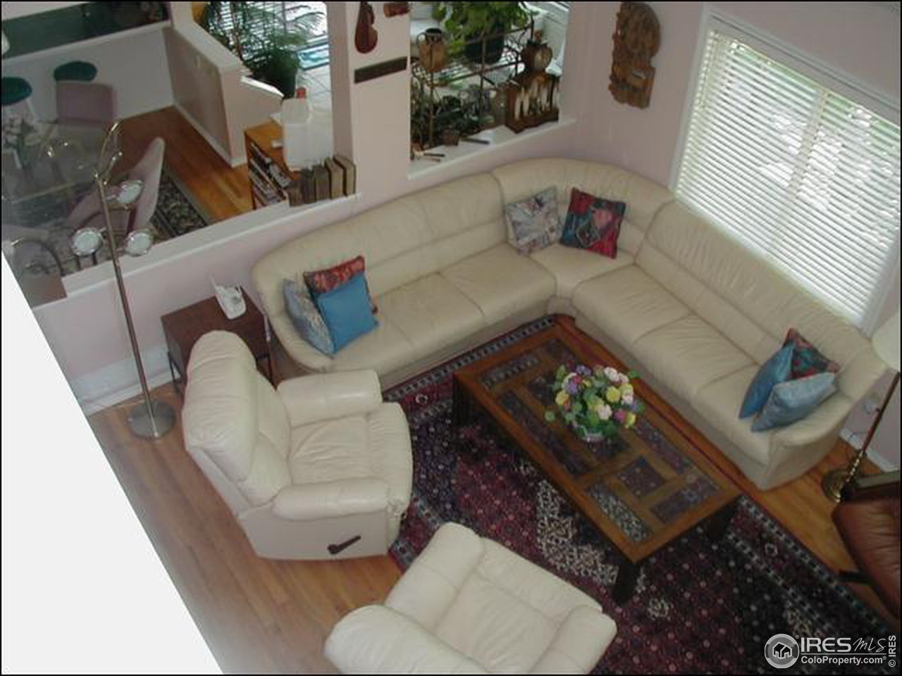 7223 Four Rivers Road Boulder, CO 80301 - Photo 11 of 12 a living room with furniture and a rug