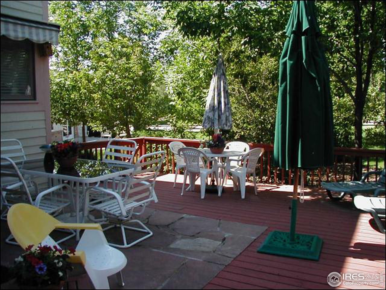 7223 Four Rivers Road Boulder, CO 80301 - Photo 2 of 12 a view of outdoor dining space with seating area and potted plants