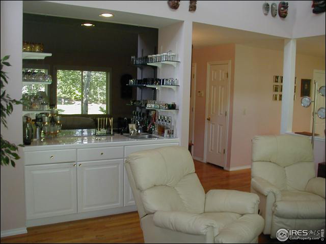 7223 Four Rivers Road Boulder, CO 80301 - Photo 9 of 12 a living room with furniture and a large window