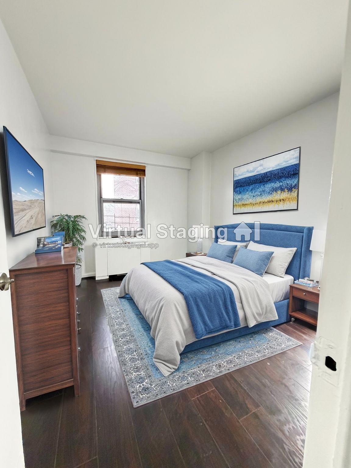85-15 Main Street, Unit 2R Queens, NY 11435 - Photo 2 of 15 a spacious bedroom with a large bed and a flat screen tv