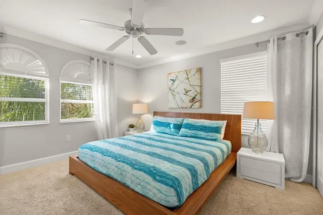 a bathroom with a tub sink and shower