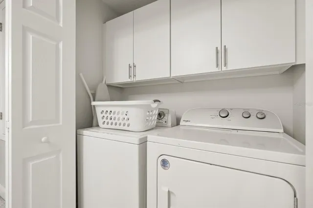 a bedroom with a bed and hallway